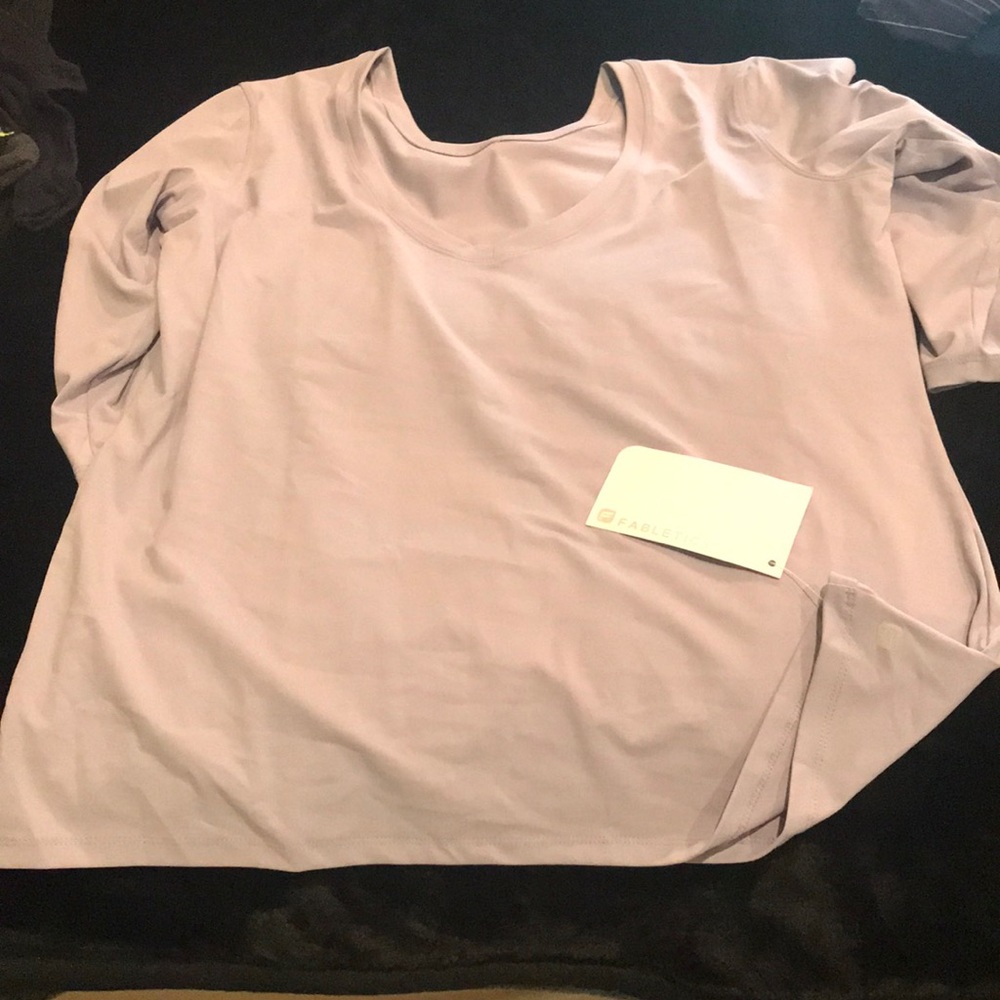 Moisture wicking workout 3/4 sleeve top.
